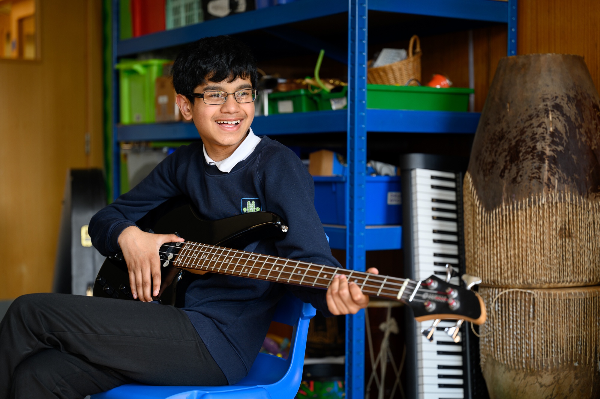 Student playing guitar